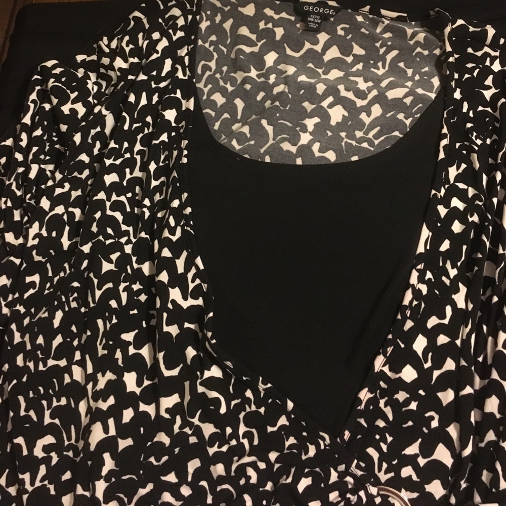 Beautiful kick wrapped black and white blouse